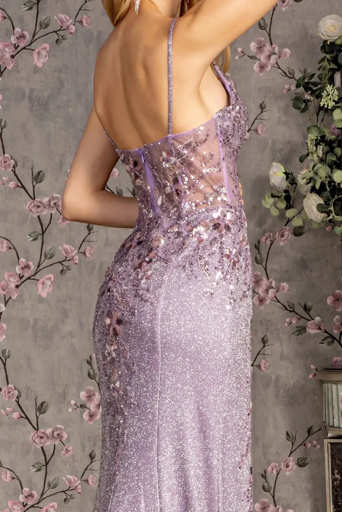 Back detail shows lilac mother of the bride dress featuring open back bodice finished with beads, embroidery, glitter, sequin.