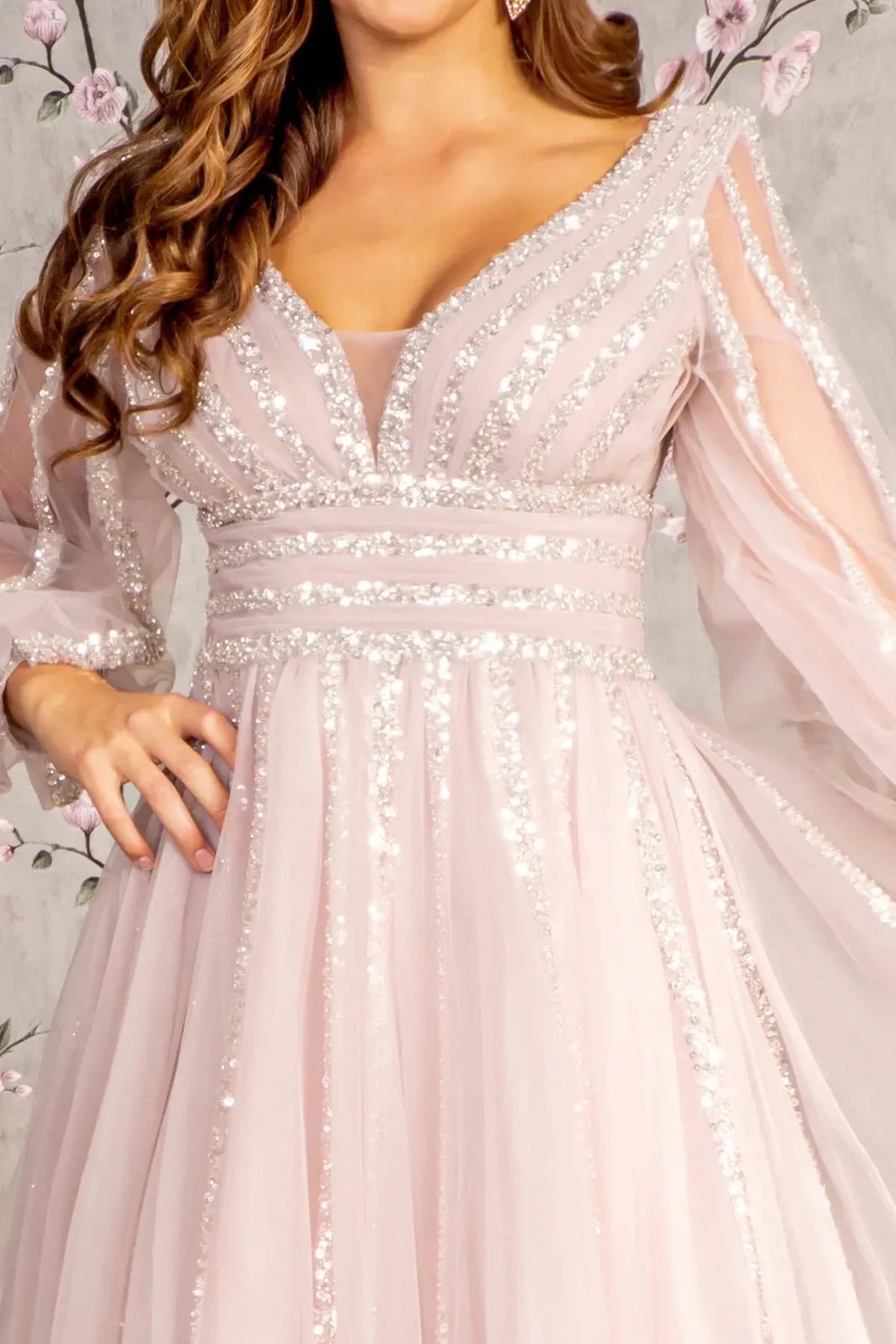 Bodice close-up highlights mauve mother of the bride dress featuring illusion sweetheart bodice with long sleeve and beads, sequin.
