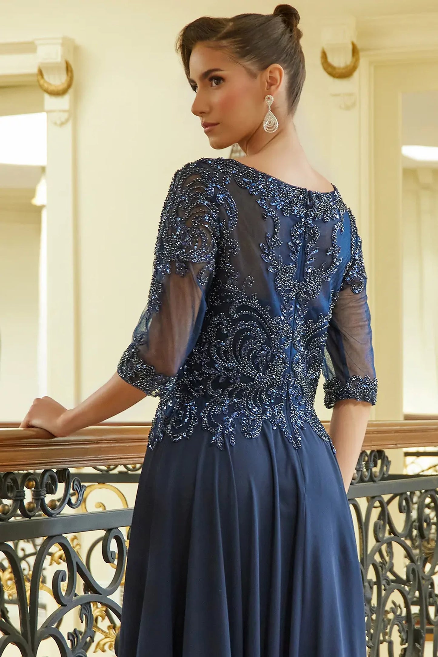 Navy mother of the bride dress featuring concealed zipper back bodice finished with beads, sequin