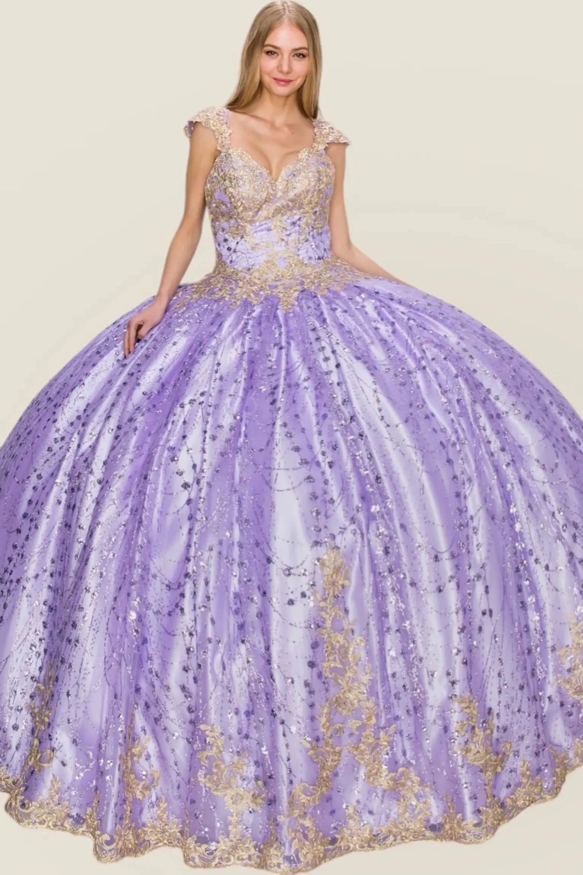 Skirt detail shows lilac quinceanera dress with gold embroidery, glitter tulle skirt, satin fabric, and rhinestone embellishments.