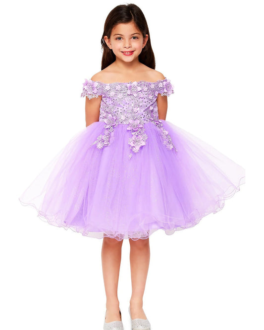 Young girl wearing a lilac off-shoulder dress with floral embellishments on a white background