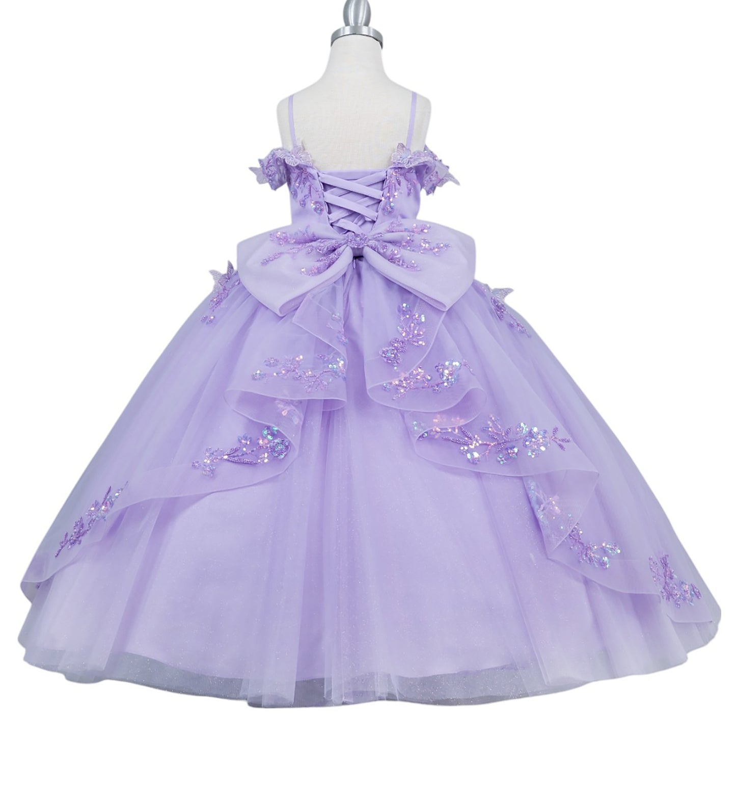Lavender dress with floral embellishments on a mannequin against a white background