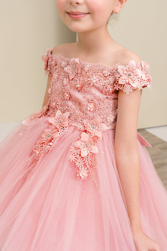 Pink floral dress worn by a young girl against a neutral background