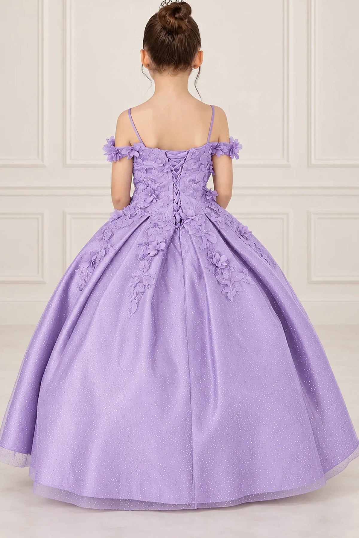 Ribbon lacing closes the floral bodice of the Lilac mini quinceañera dress above a gathered, glitter-dotted skirt.