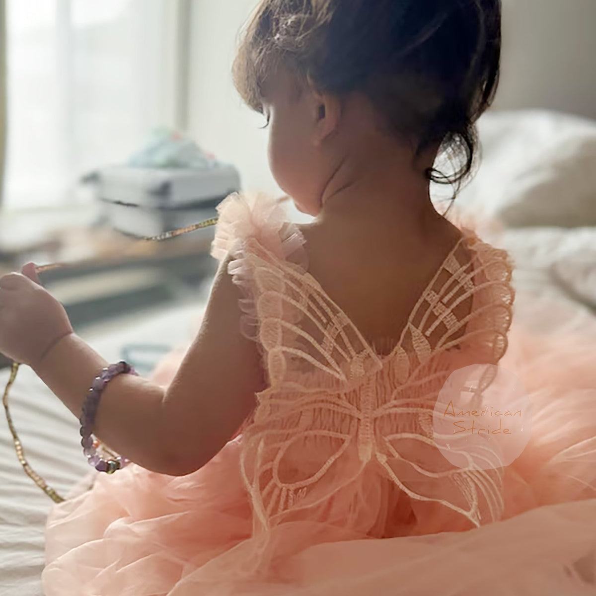 Full-length view highlights blush Baby Blush Butterfly Wings Lace Tulle flower girl dress I Dress.