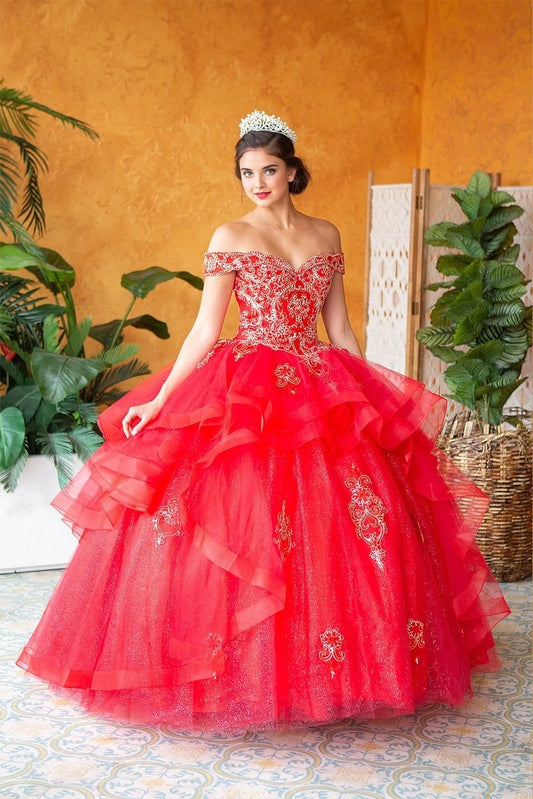 Red quinceañera ball gown with ornate off-shoulder embroidery and a glittering tiered ruffle skirt.