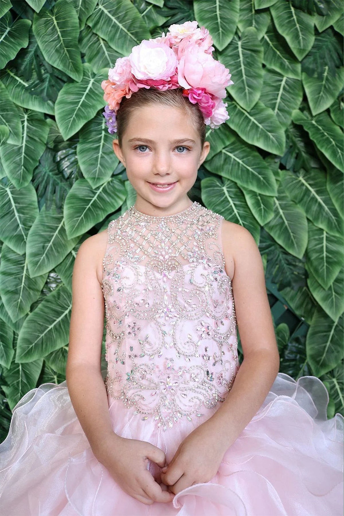 The additional image shows the sparkling stone-embellished bodice on the Blush mini quince dress.