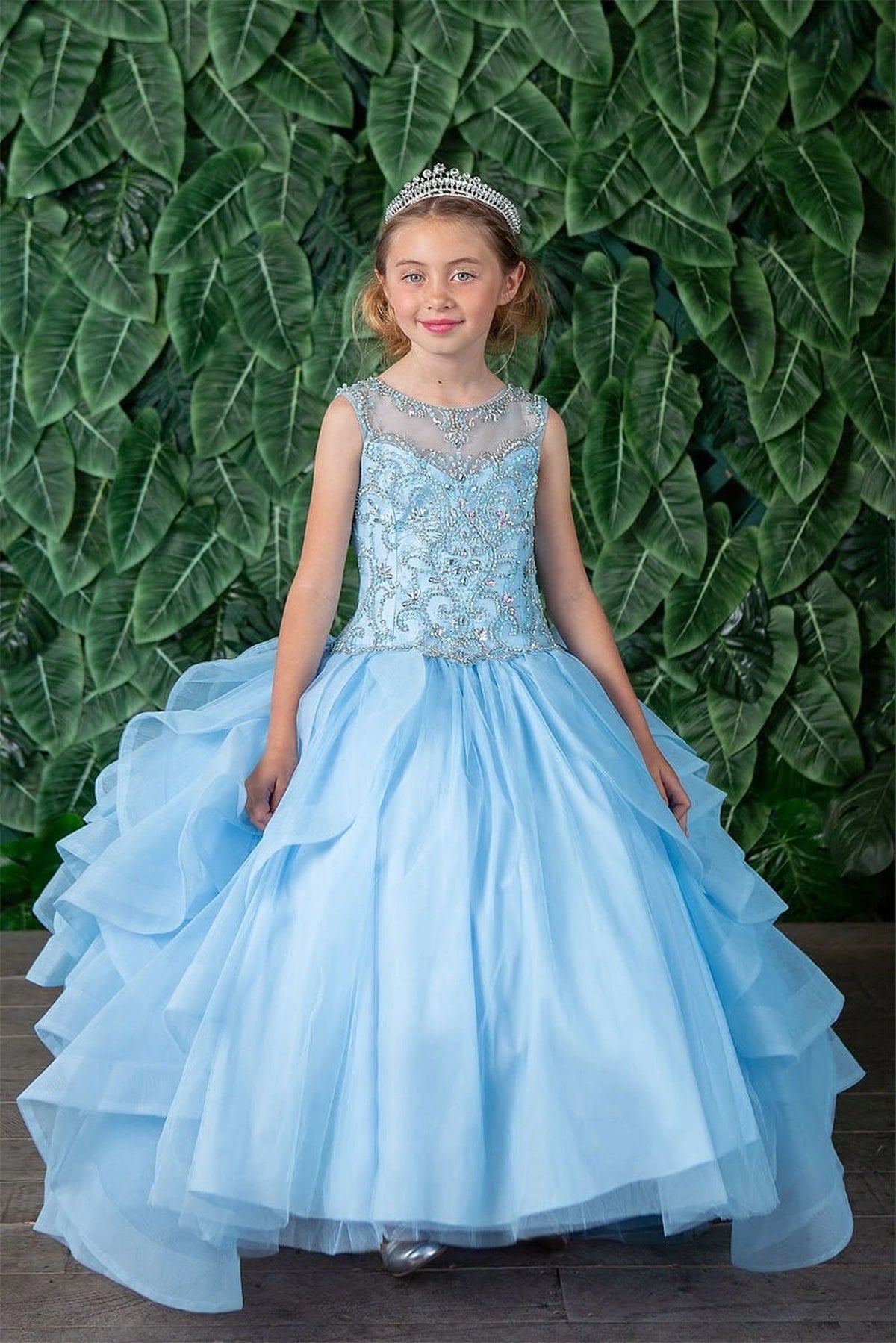 Another full view presents cascading layered ruffle skirt on the Bahama Blue mini quince dress.