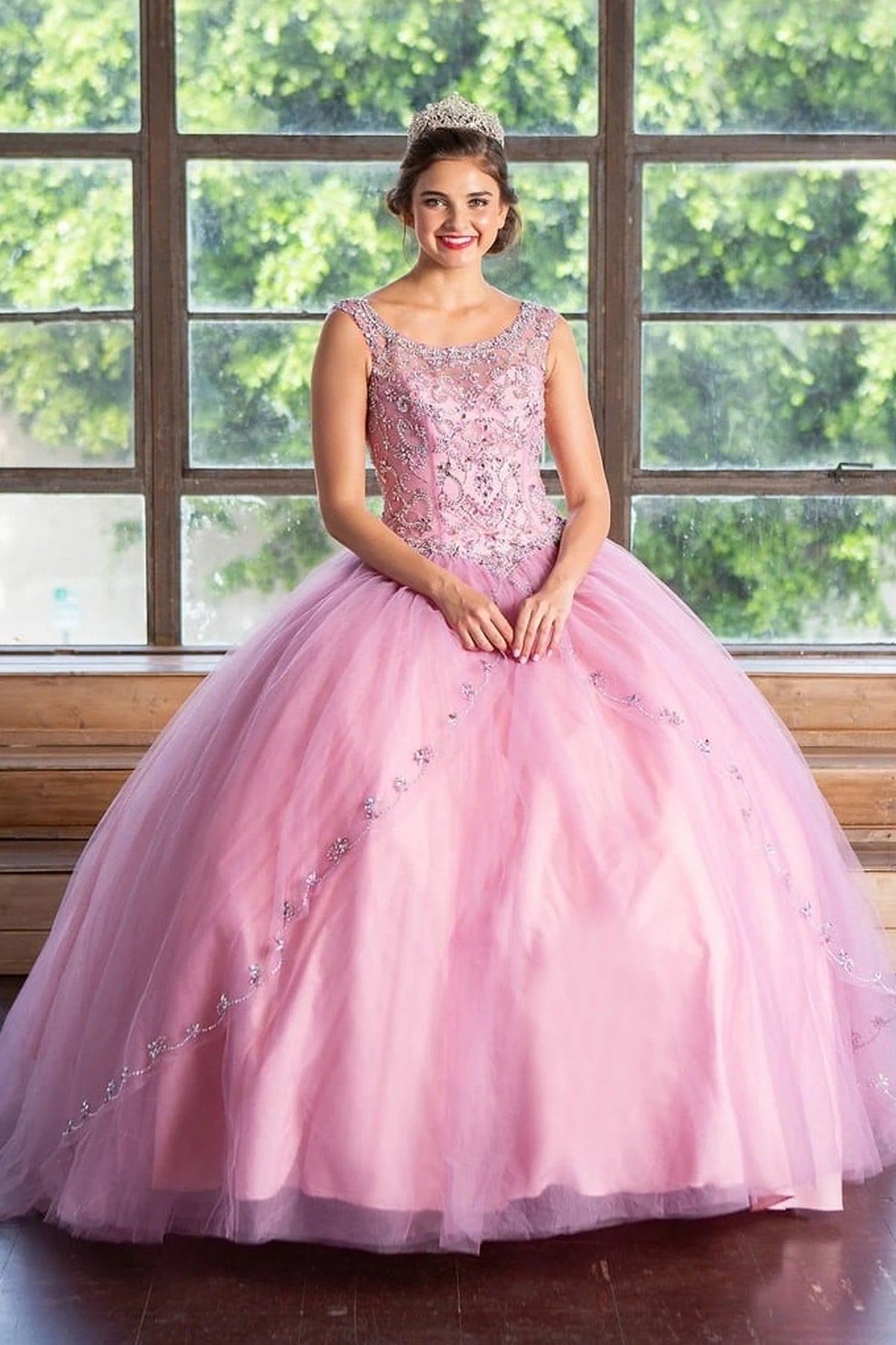 Mauve Rose quinceañera dress showcases jeweled sleeveless bodice above softly layered full skirt.