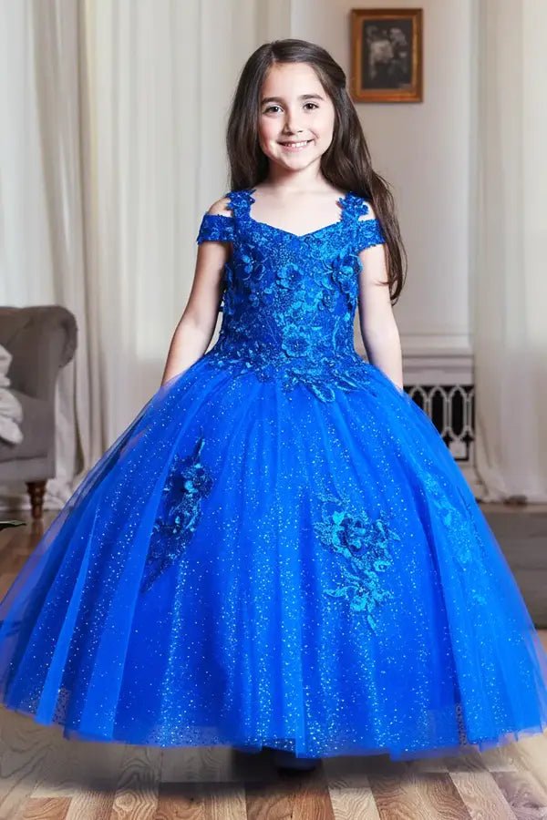 Kid standing front-facing in elegant royal blue mini quince dress with shiny tulle bodice and voluminous short skirt