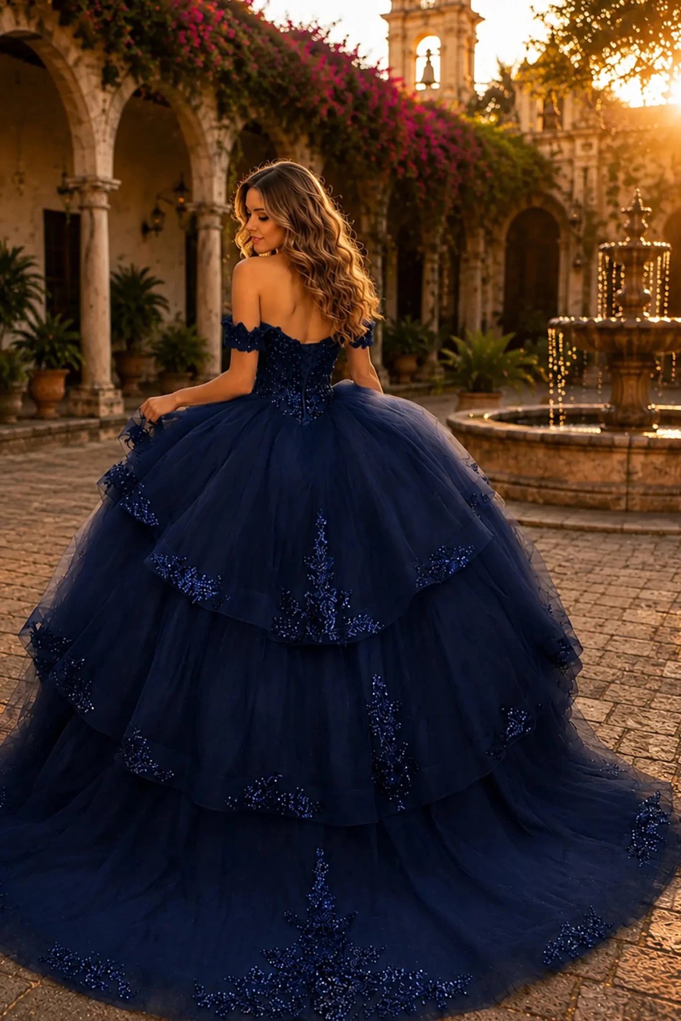 Navy quinceanera ball gown with lace-up corset, sequined bodice, beadwork and embroidered chapel-length train
