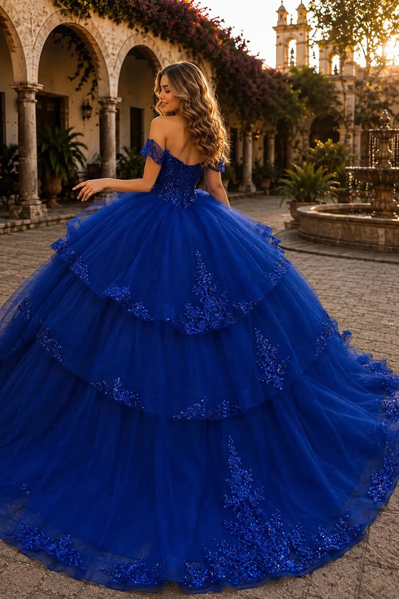 Royal blue quinceanera ball gown with lace-up corset, sequined bodice, beadwork and embroidered chapel-length train