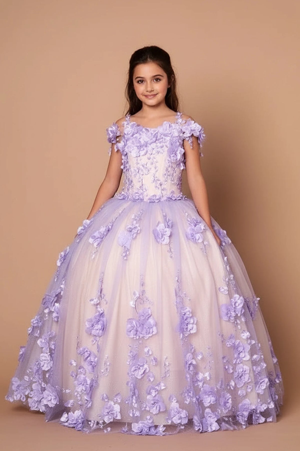 At the bodice and skirt, the Lilac mini quince dress showcases bold floral embroidery from bodice to hem and full tulle skirt with dimensional appliqué.