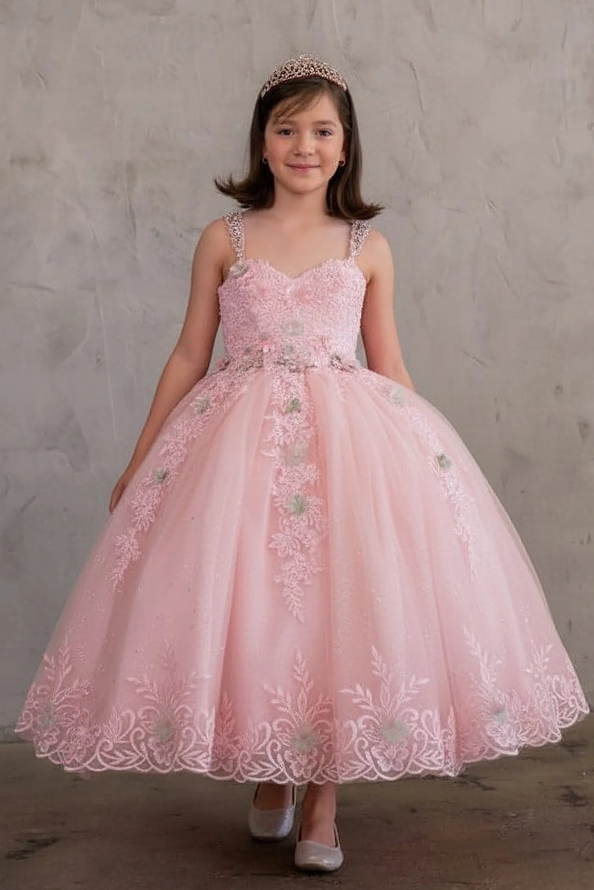 Another full view presents full tulle skirt with embroidered lace trim on the Blush Pink mini quince dress.