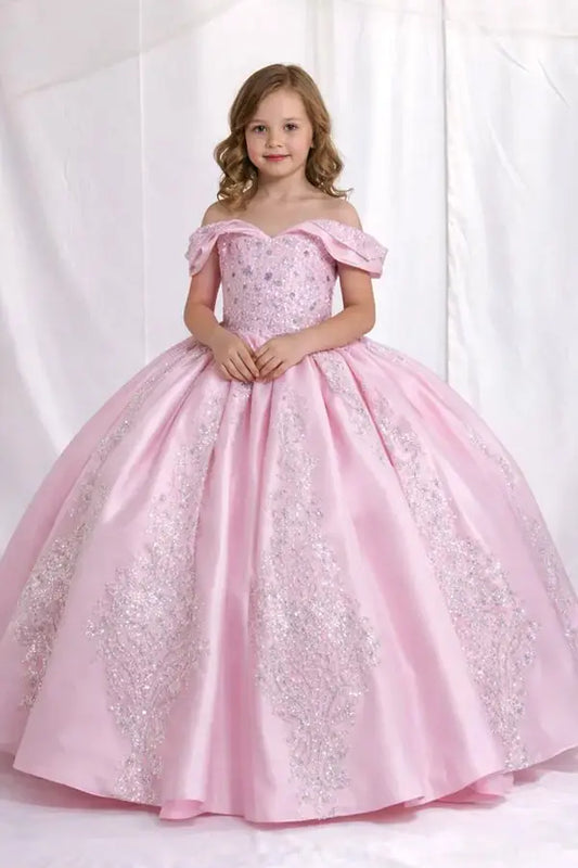 Kid standing front-facing in elegant pink ball gown with lace appliqué bodice and glitter tulle layered skirt