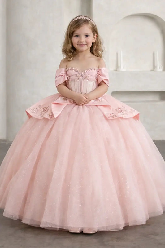 Kid standing front-facing in stunning lilac ball gown with beaded fringe detail and 3D floral appliqué bodice, paired with glitter tulle layered skirt