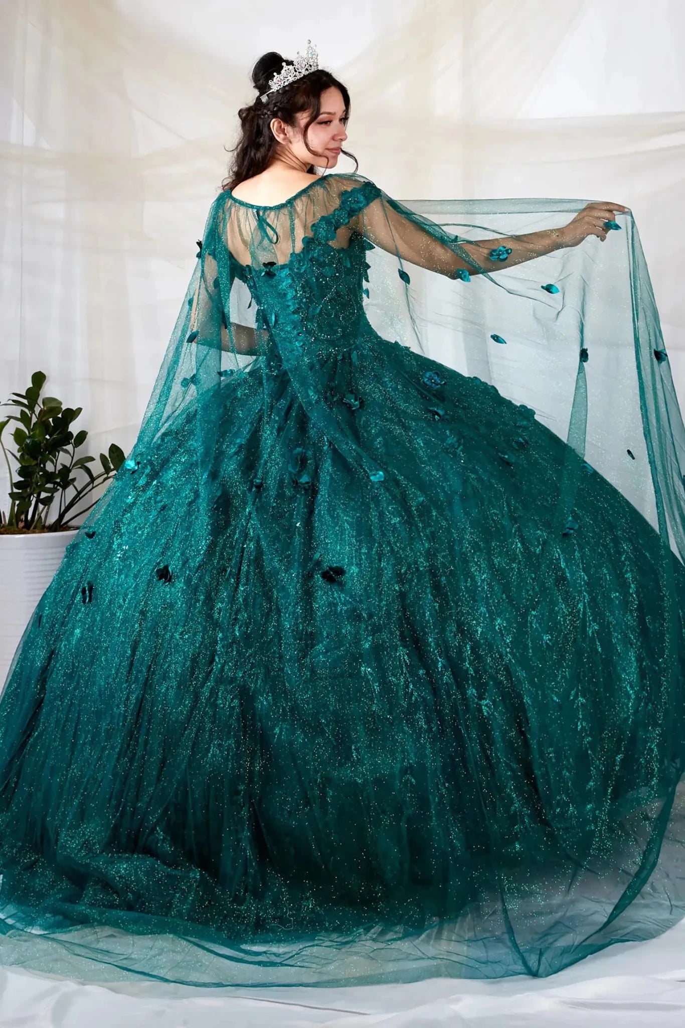 Green quinceañera ball gown with 3D floral applique and detachable sheer flowing cape