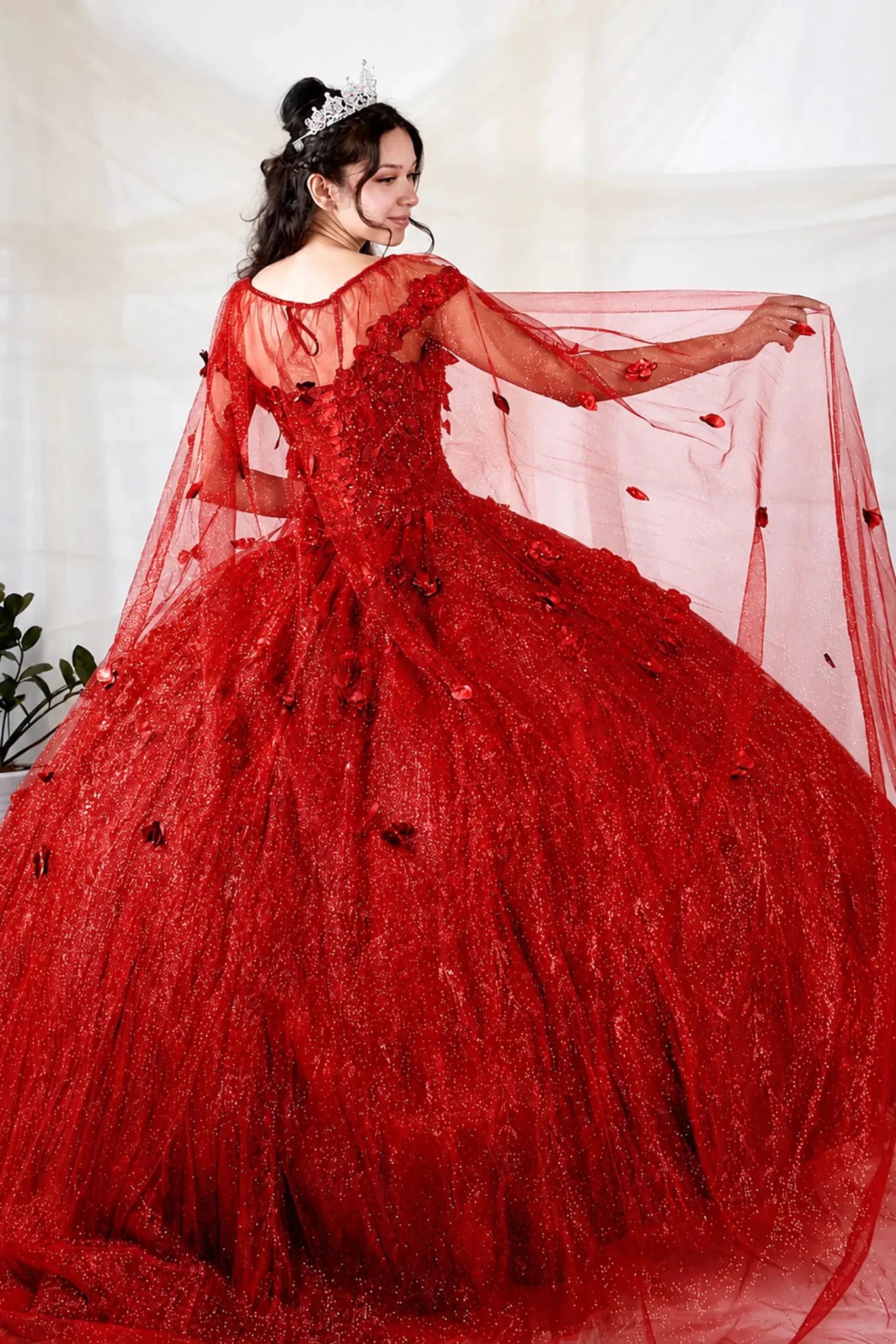 Red quinceañera ball gown with 3D floral applique and detachable sheer flowing cape