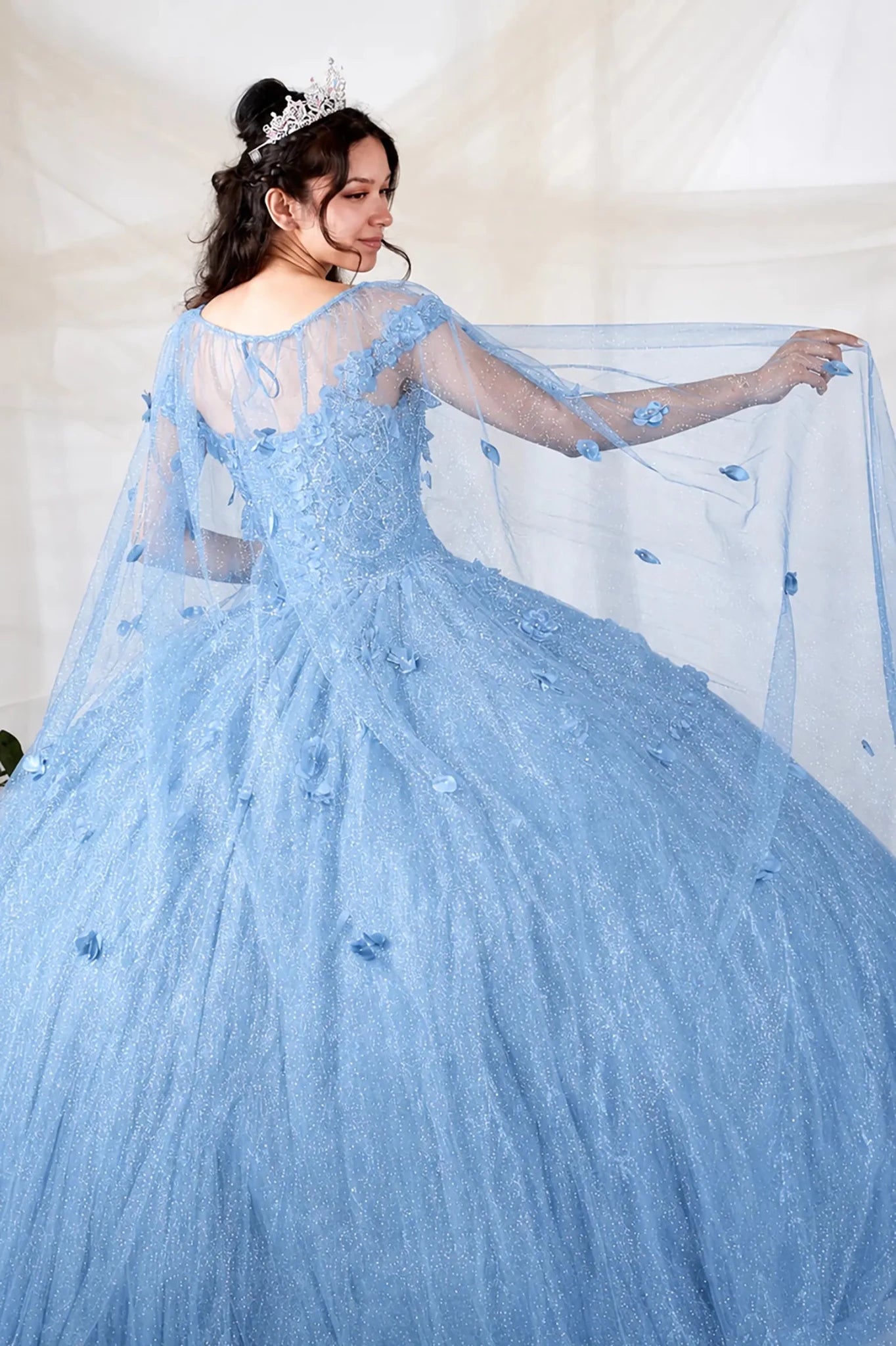Sky blue quinceañera ball gown with 3D floral applique and detachable sheer flowing cape