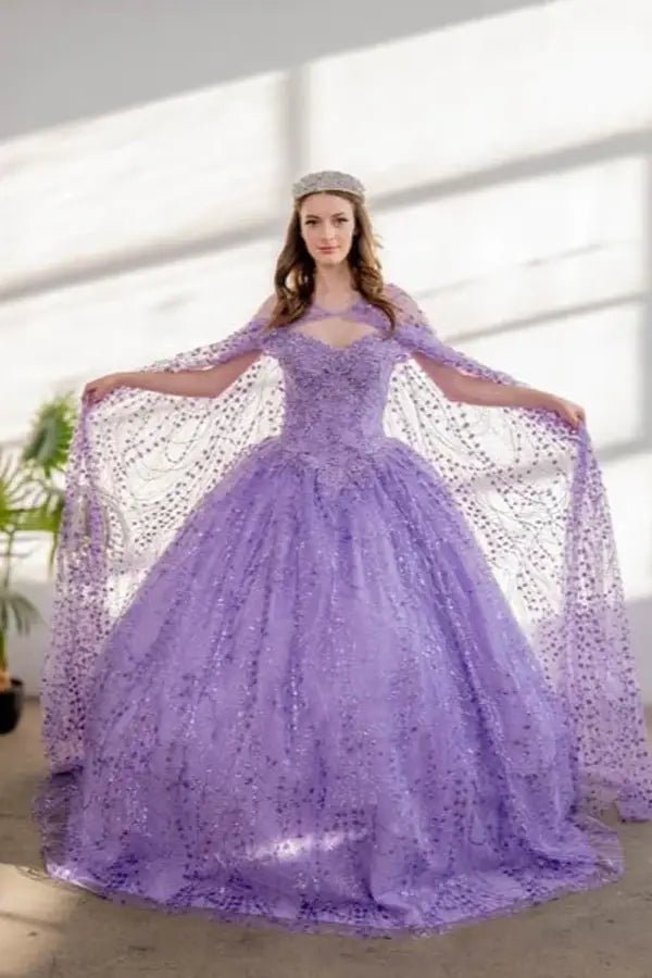 Front-Facing of a woman wearing Lilac formal dress featuring open back sweep train and lightweight cape detail