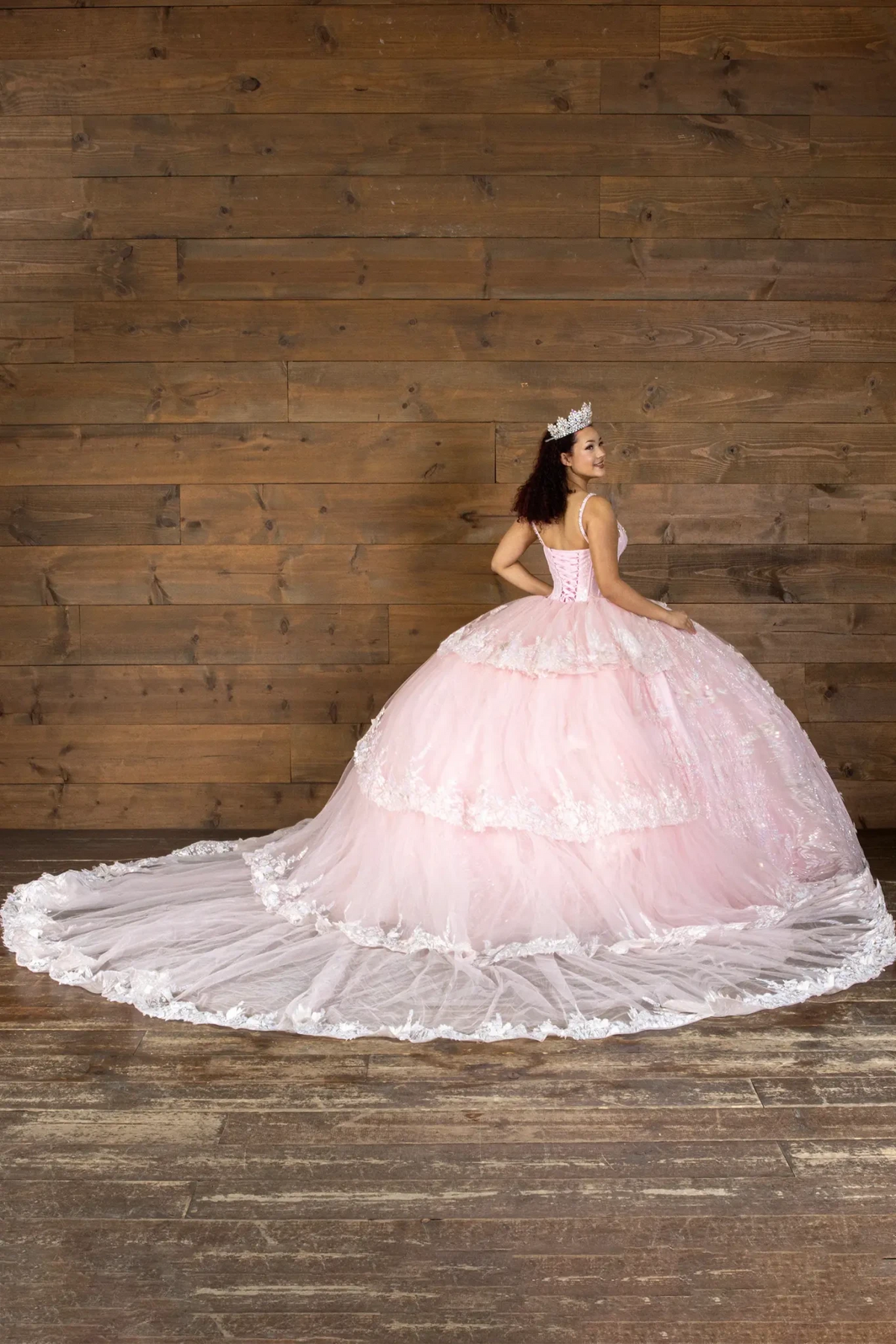 Blush quinceañera ball gown with crystal beaded bodice and detachable long train