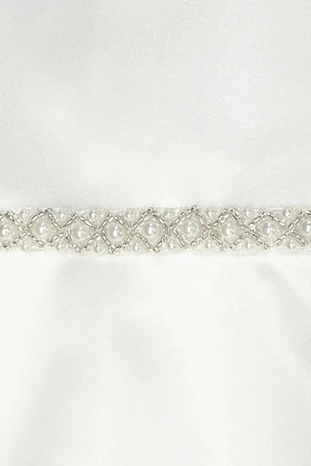 White pearl first communion veil.