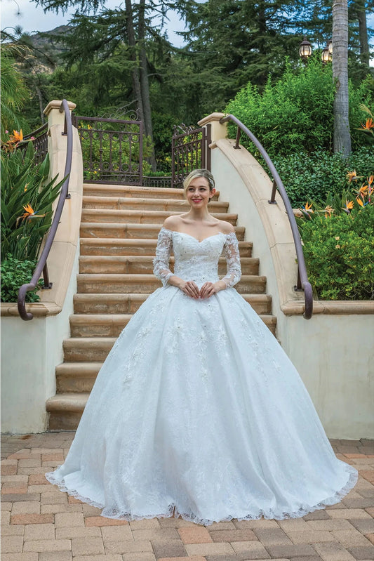 Featuring a floor-length skirt, this Off-White wedding dress is shown in full view.