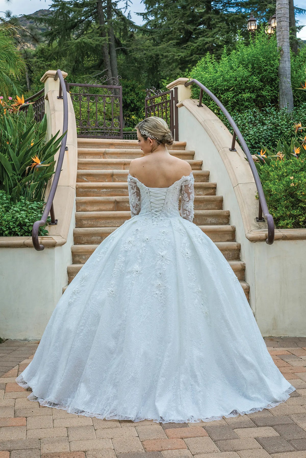 From the back, the Off-White wedding dress reveals its floor-length skirt.