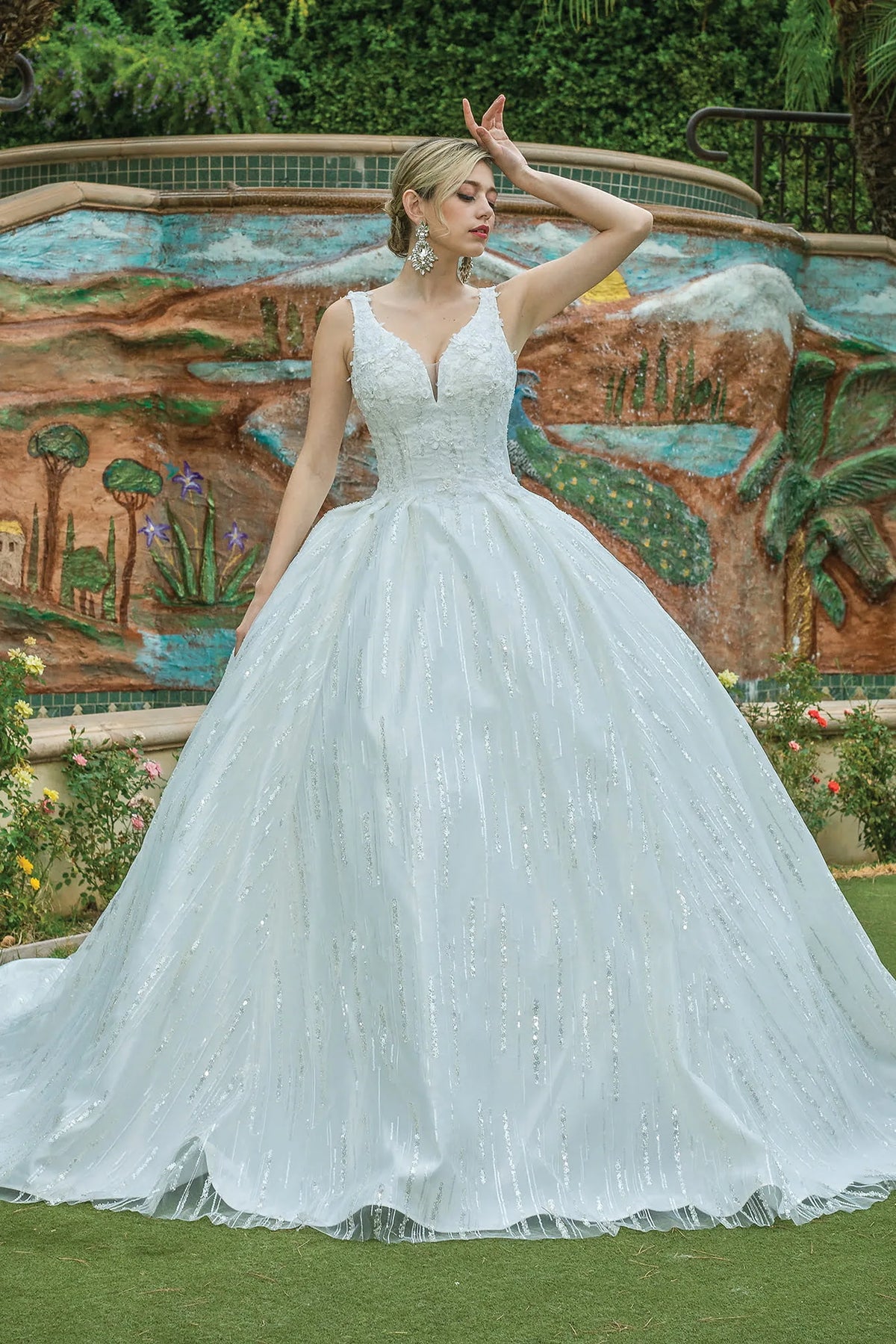 Featuring a floor-length skirt, this Off-White wedding dress is shown in full view.
