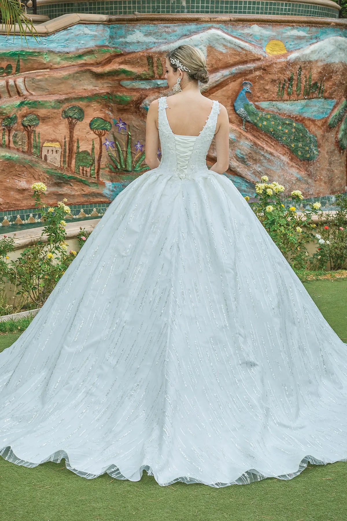 From the back, the Off-White wedding dress reveals its floor-length skirt.