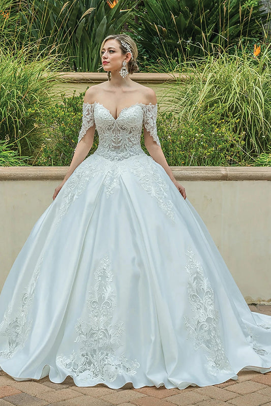 Featuring a floor-length skirt, this Off-White wedding dress is shown in full view.