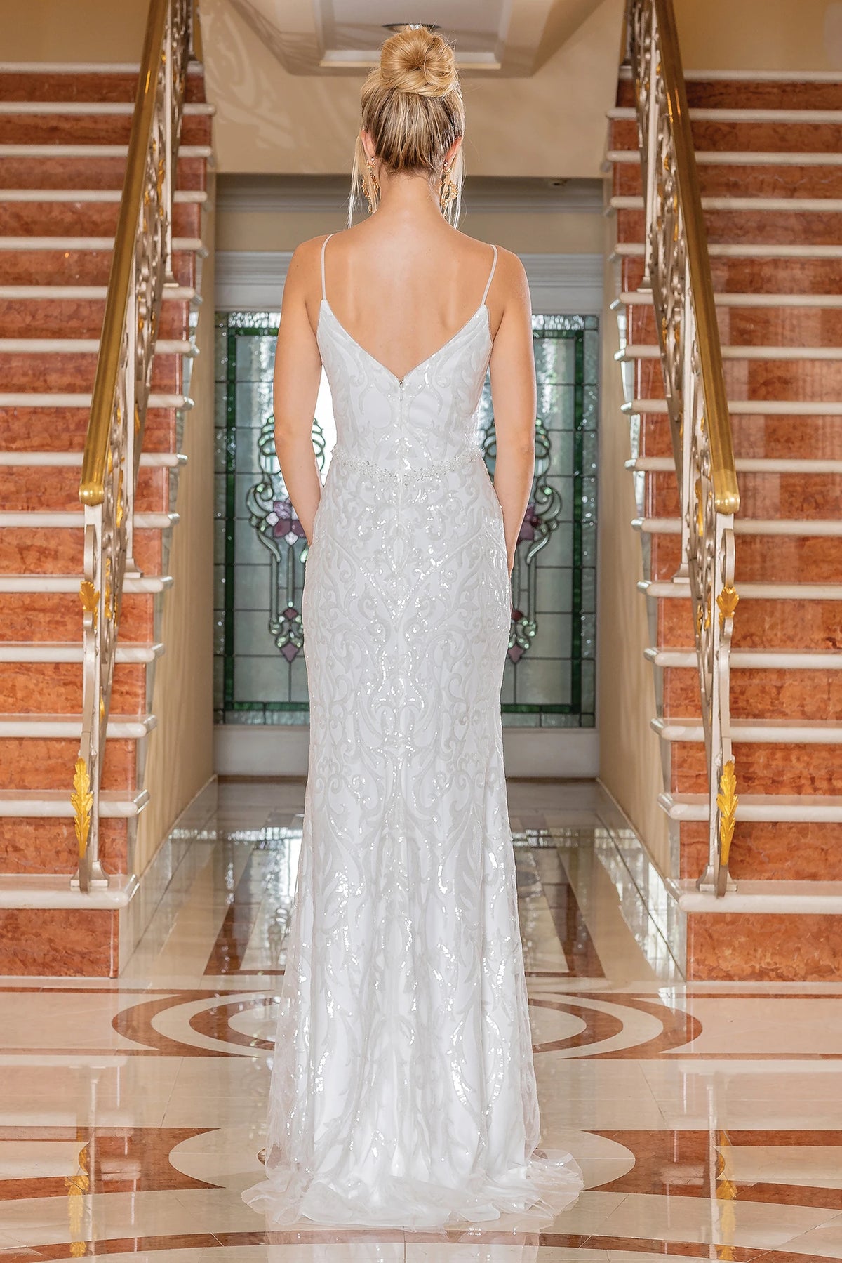 From the back, the Off-White wedding dress reveals its floor-length skirt.