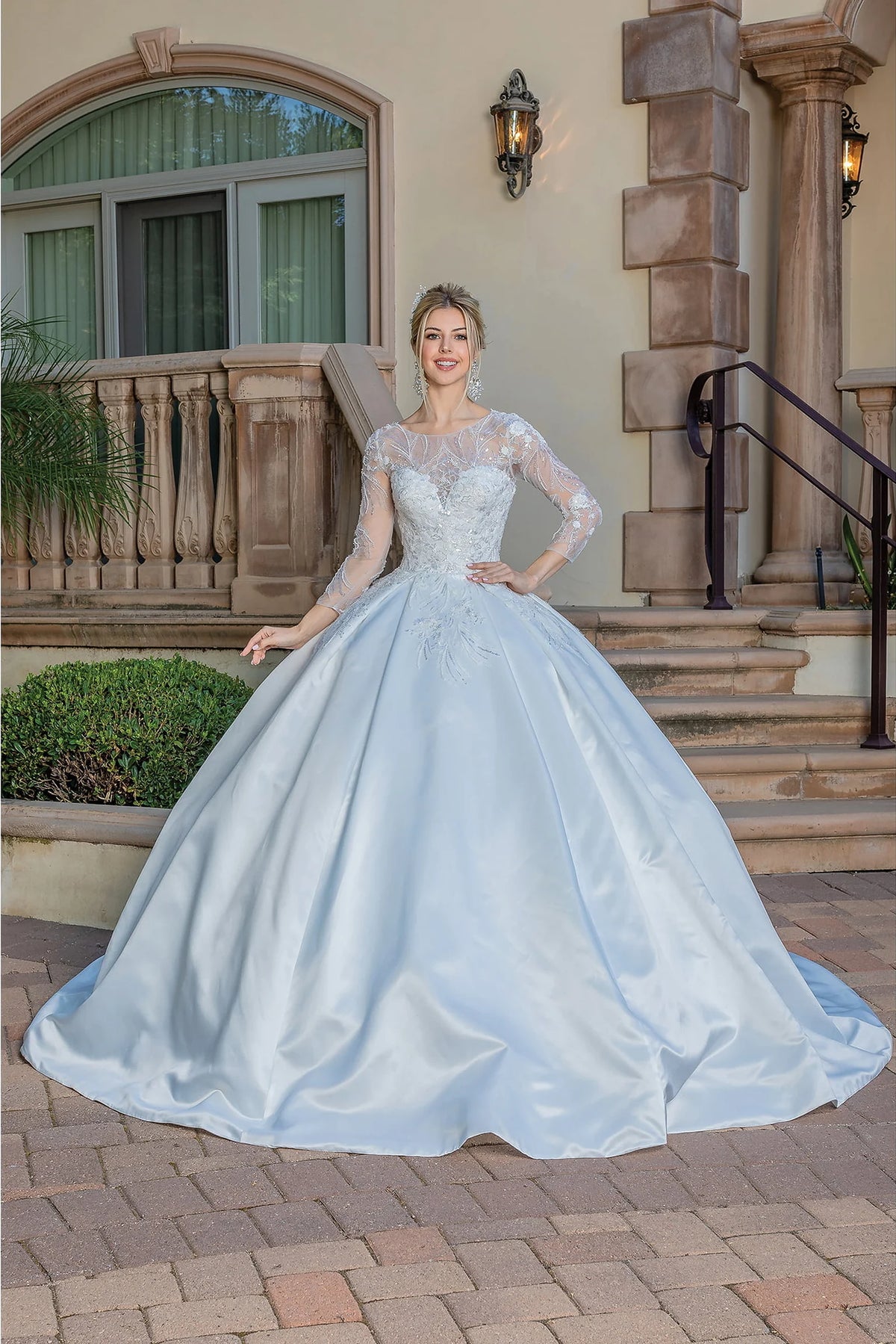 Featuring a floor-length skirt, this Off-White wedding dress is shown in full view.