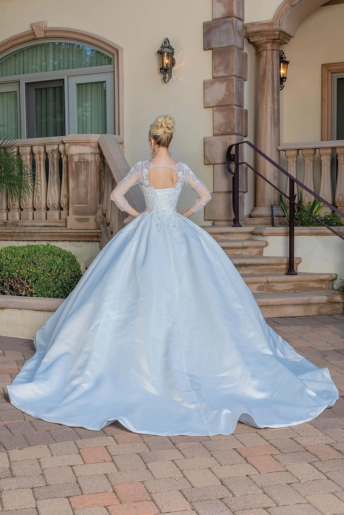 From the back, the Off-White wedding dress reveals its floor-length skirt.