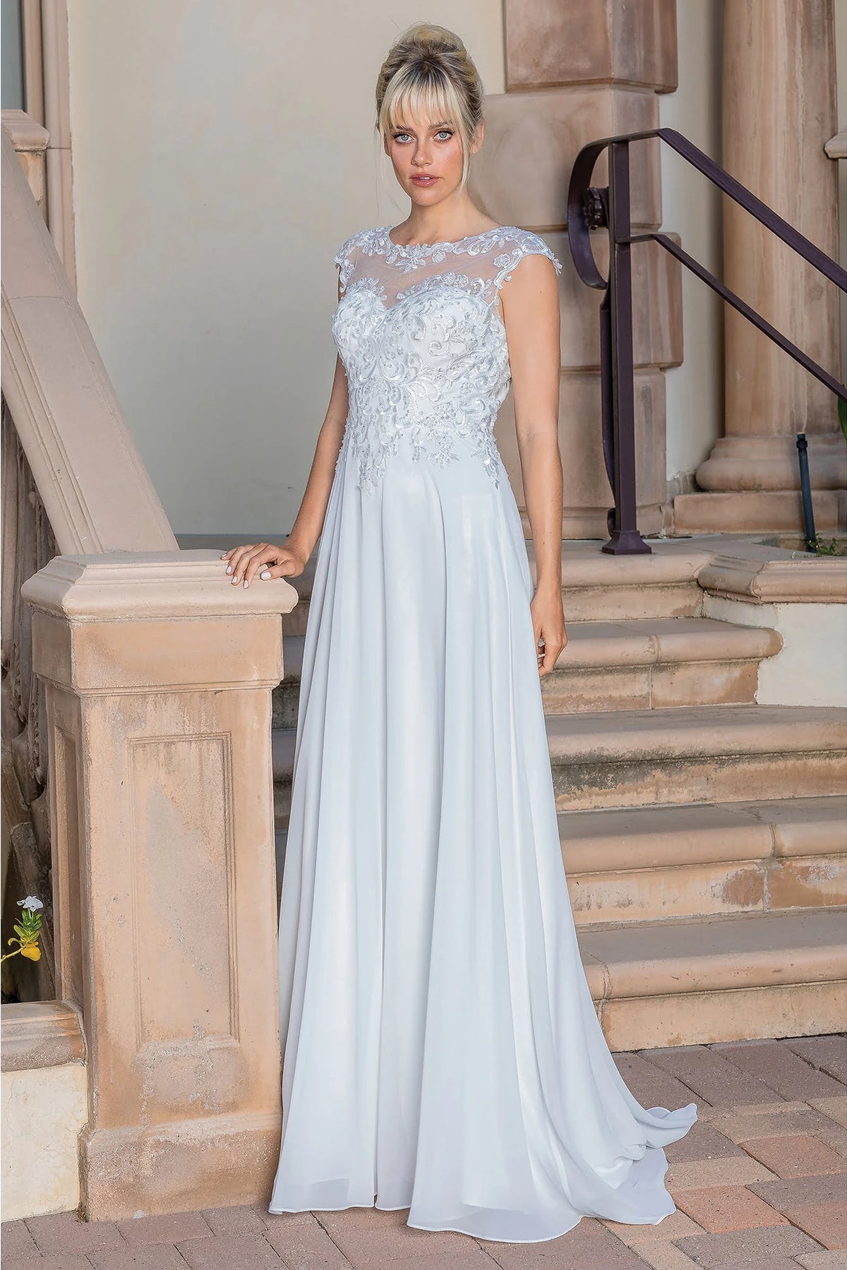 Featuring a floor-length skirt, this Off-White wedding dress is shown in full view.