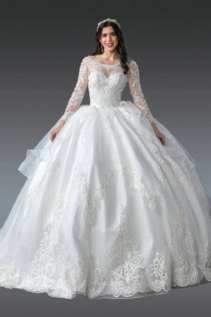 Woman in Off white long sleeve lace wedding gown with illusion neckline and full skirt.