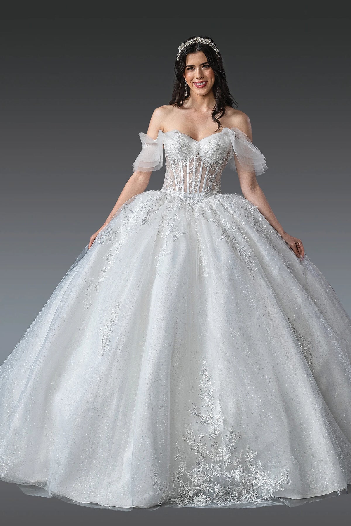 Featuring a floor-length skirt, this Off-White wedding dress is shown in full view.