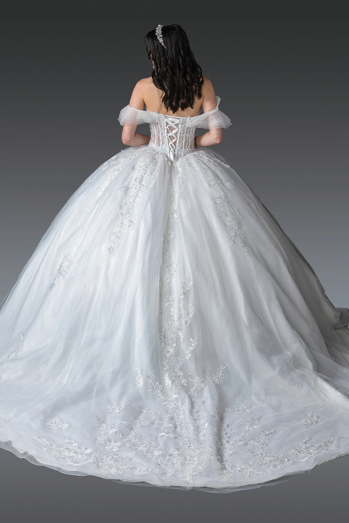 From the back, the Off-White wedding dress reveals its floor-length skirt.