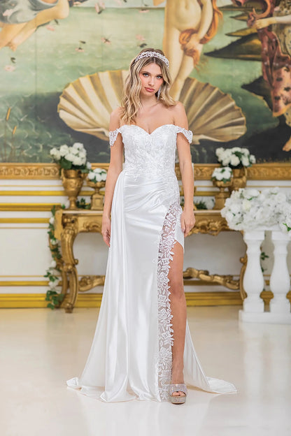 Woman in Off white off-shoulder satin wedding dress with floral lace trim and high slit.