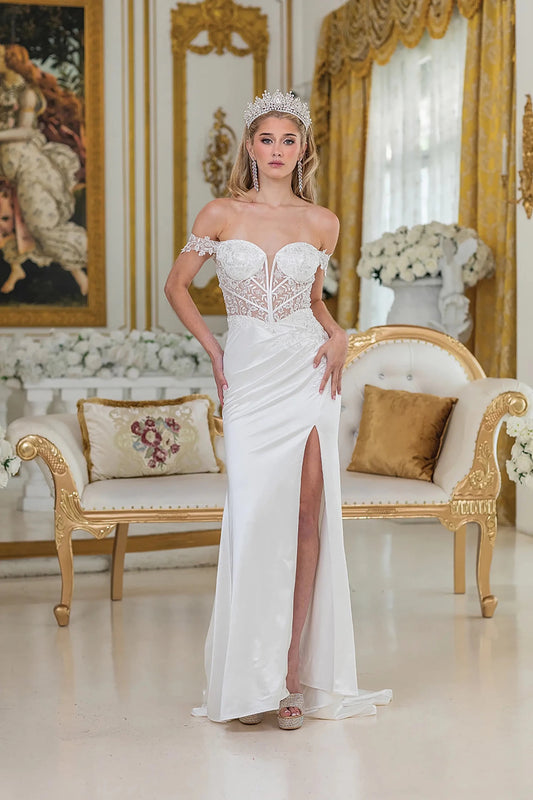 Woman in Off white satin wedding dress with sheer corset and high slit.