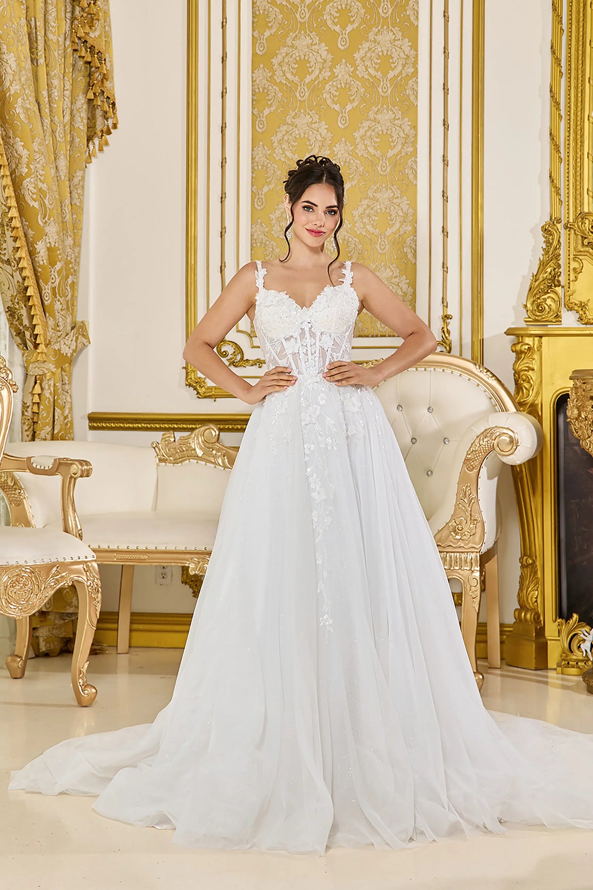 Showing a floral lace corset above its A-line skirt, this Off-White wedding dress is shown in full view.