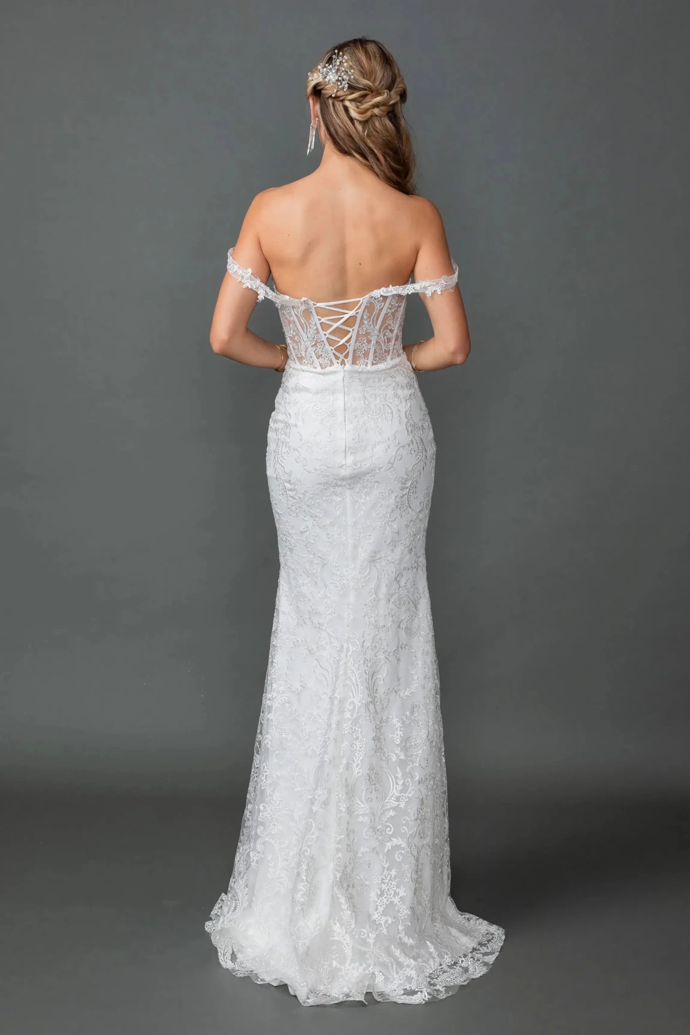 Back full Length view of Sophisticated Off White Off-Shoulder Corset Mermaid Wedding Gown
