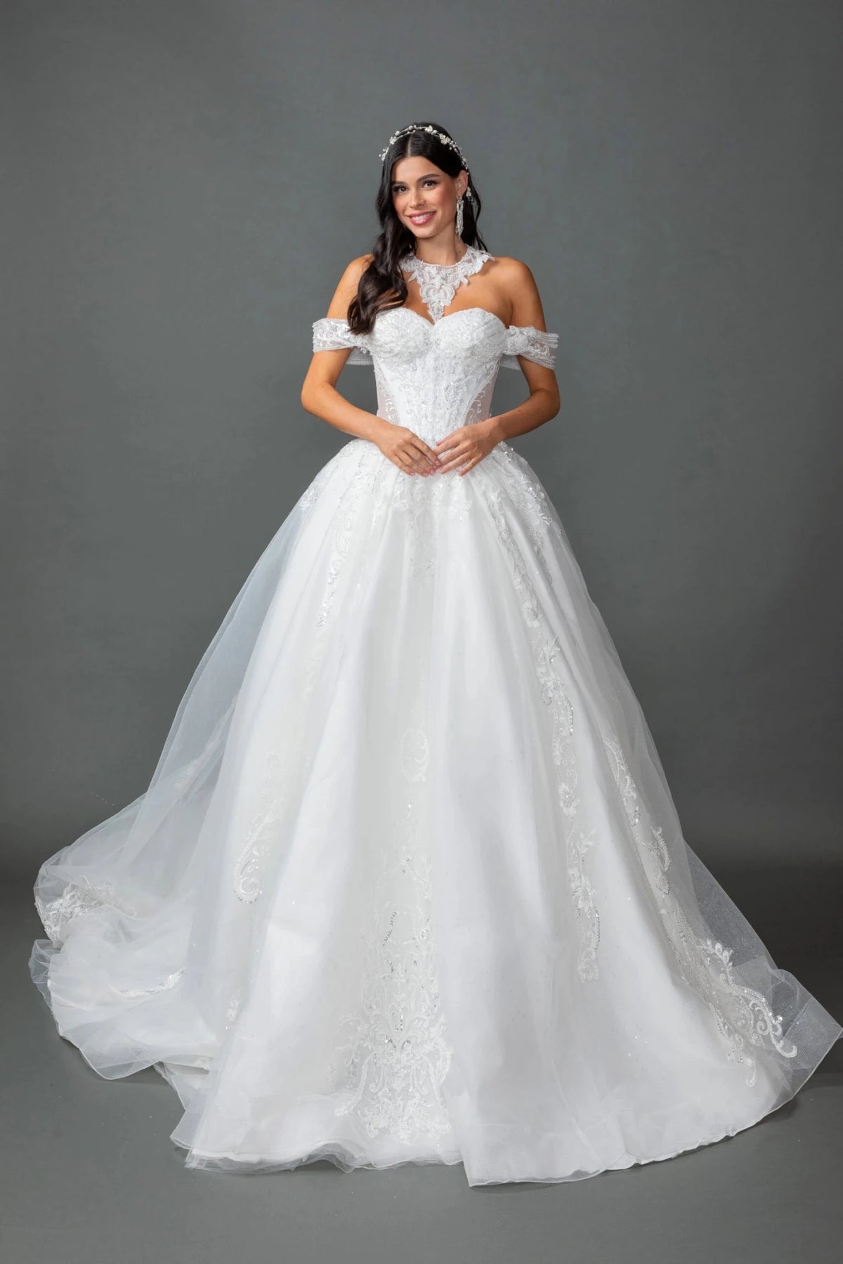 Featuring a floor-length skirt, this Off-White wedding dress is shown in full view.