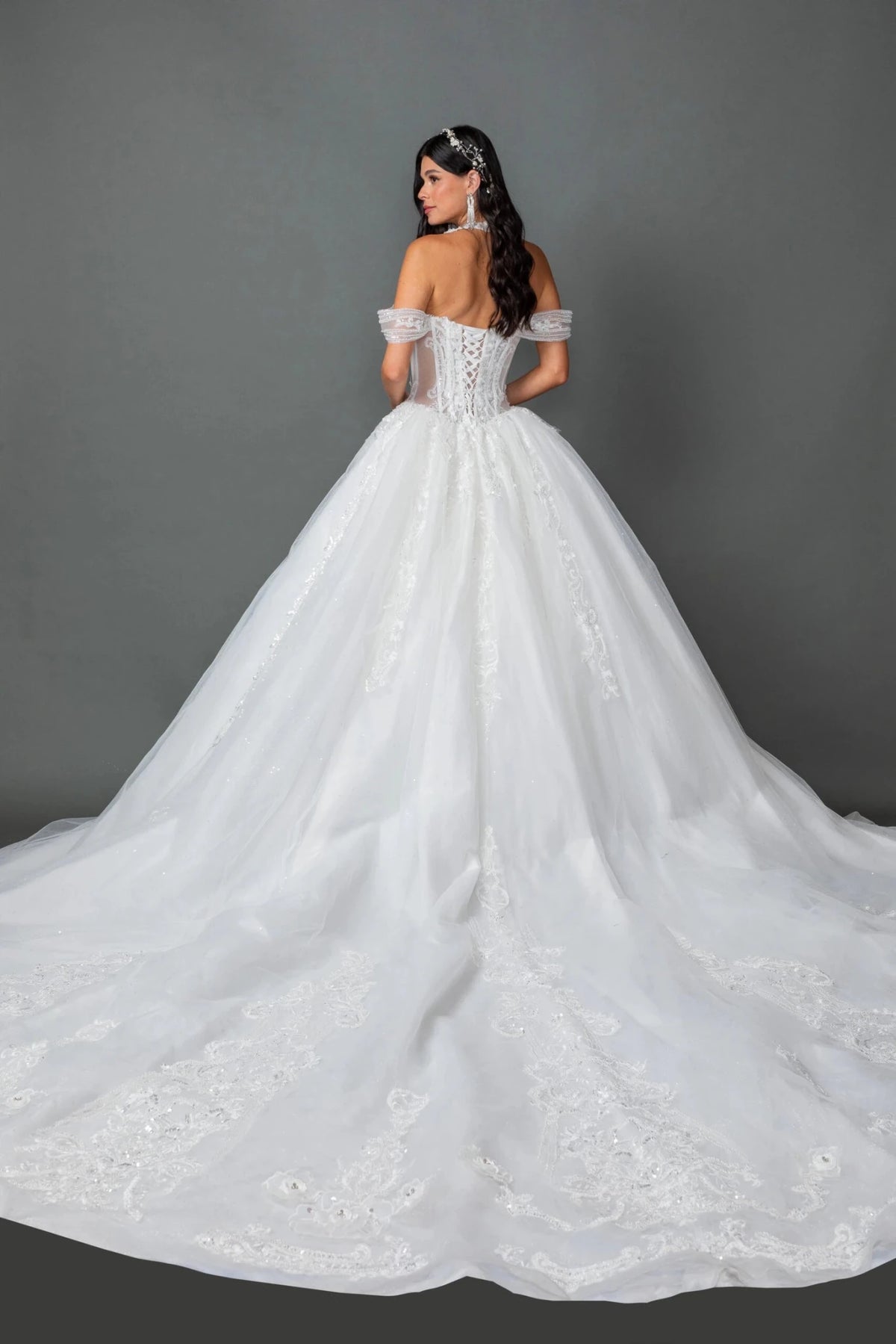 From the back, the Off-White wedding dress reveals its floor-length skirt.