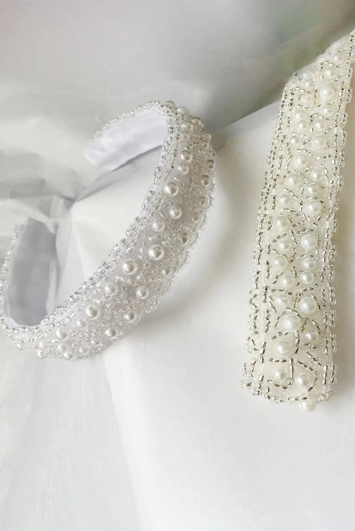White pearl satin flower girl headband.