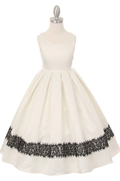 Ivory flower girl dress features pleated satin skirt with black lace hem.