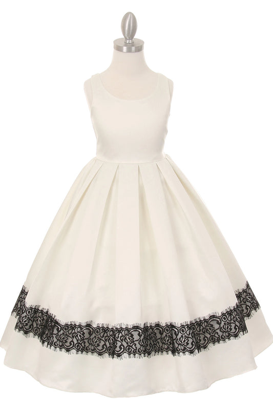 Ivory flower girl dress features pleated satin skirt with black lace hem.