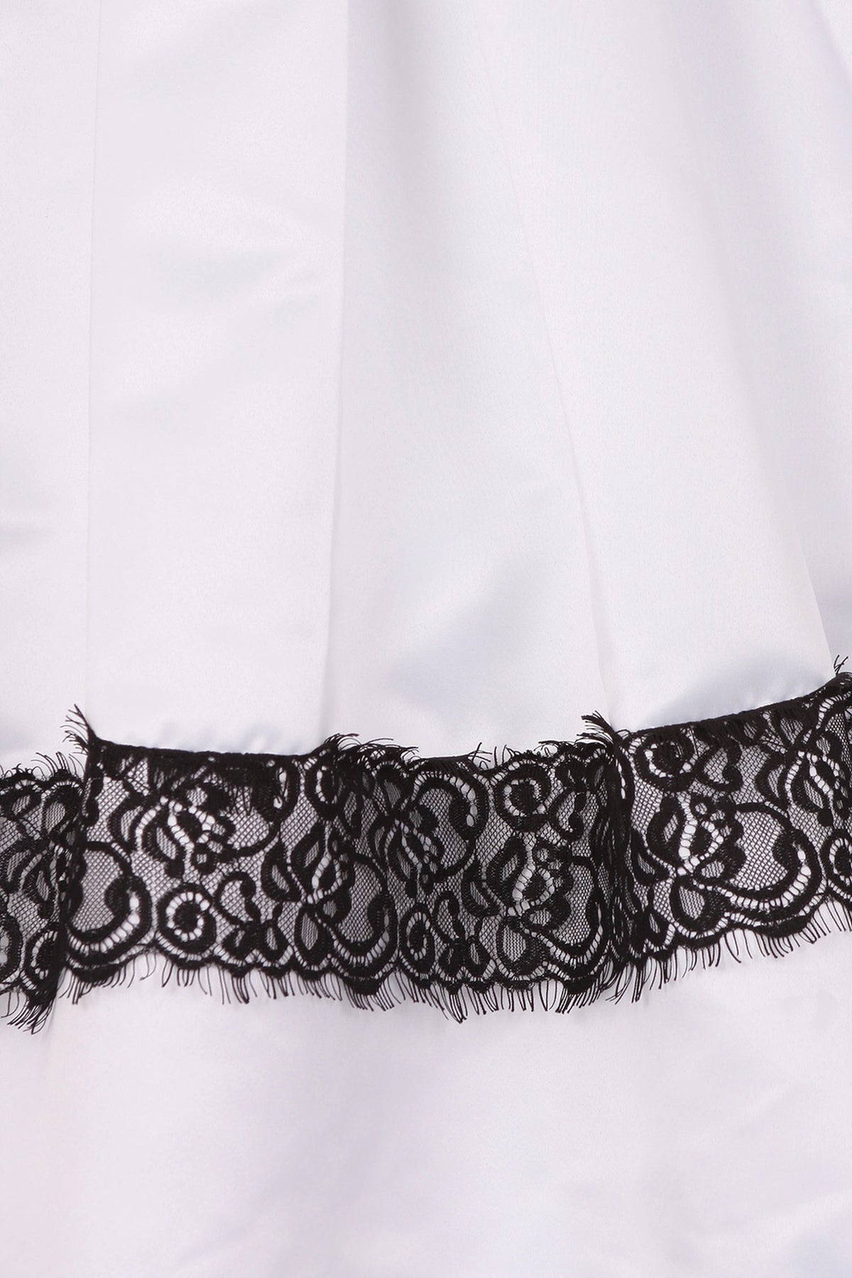 Featuring floral lace detailing at the lower skirt on the White flower girl dress.