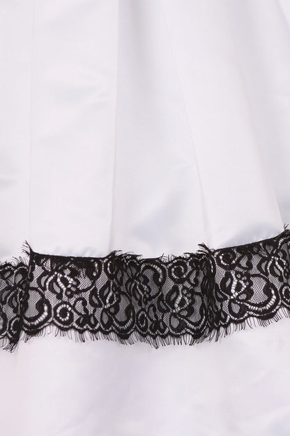 Featuring floral lace detailing at the lower skirt on the White flower girl dress.