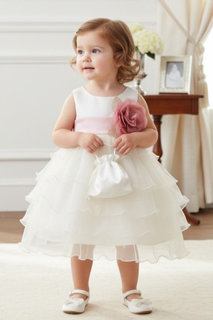 Ivory Rose flower girl Dress Front View With Satin Bodice And Layered Organza Skirt.